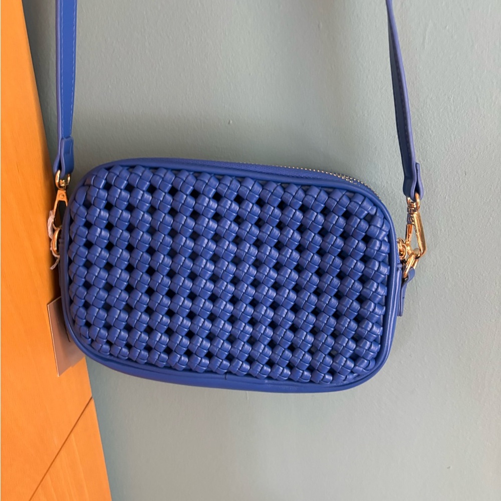 Mali+Lili vegan blue crossbody with two compartments.